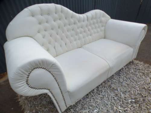 A gorgeous, quality PU leather Chesterfield style sofa w crystal like studs. MAGNIFICENT!!!