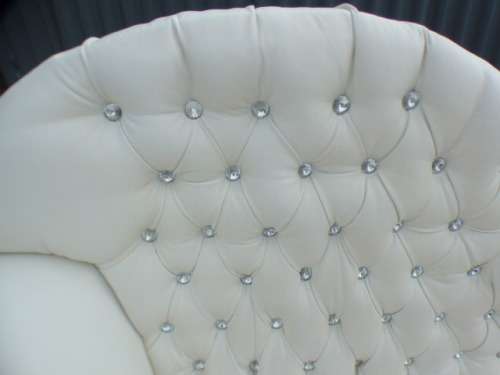 A gorgeous, quality PU leather Chesterfield style sofa w crystal like studs. MAGNIFICENT!!!