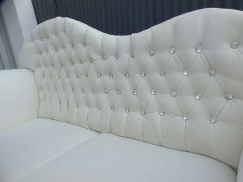 A gorgeous, quality PU leather Chesterfield style sofa w crystal like studs. MAGNIFICENT!!!
