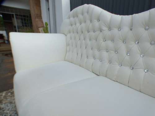 A gorgeous, quality PU leather Chesterfield style sofa w crystal like studs. MAGNIFICENT!!!