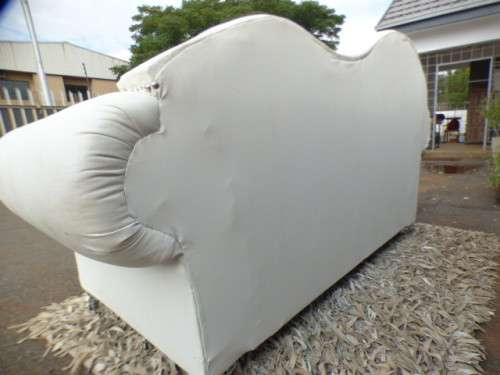 A gorgeous, quality PU leather Chesterfield style sofa w crystal like studs. MAGNIFICENT!!!