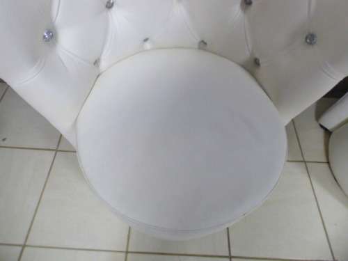 2 stunning, PU leather Chesterfield style chairs w crystal like studs. Classy & stylish! bid/chair