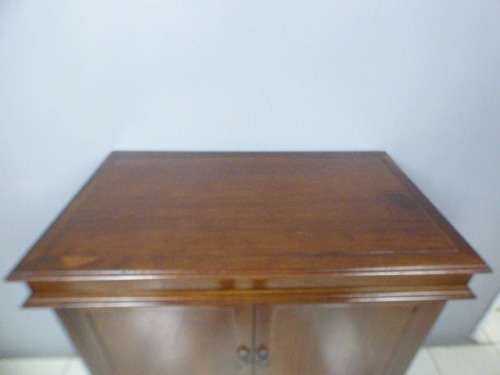 A wonderful two-door TV entertainment unit with ample space for components.