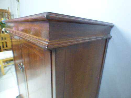 A wonderful two-door TV entertainment unit with ample space for components.