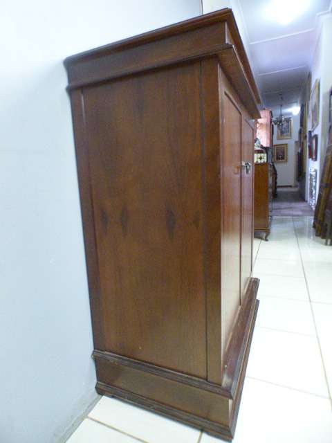 A wonderful two-door TV entertainment unit with ample space for components.