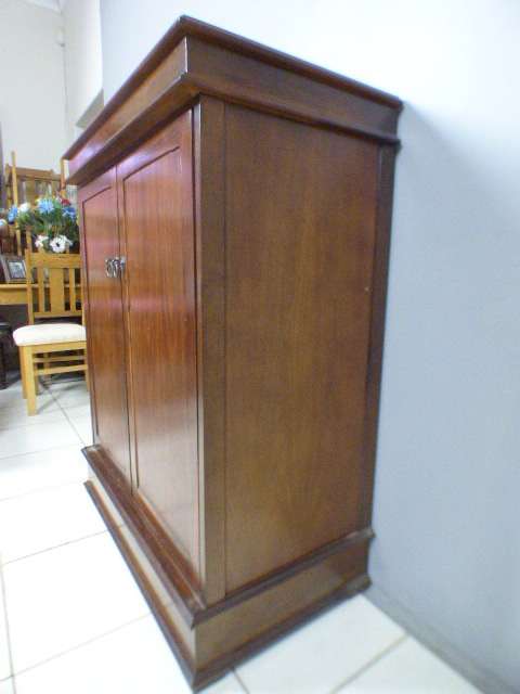 A wonderful two-door TV entertainment unit with ample space for components.