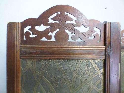 A fabulous wooden 4 panel, very ornate room divider. Beautiful!!!