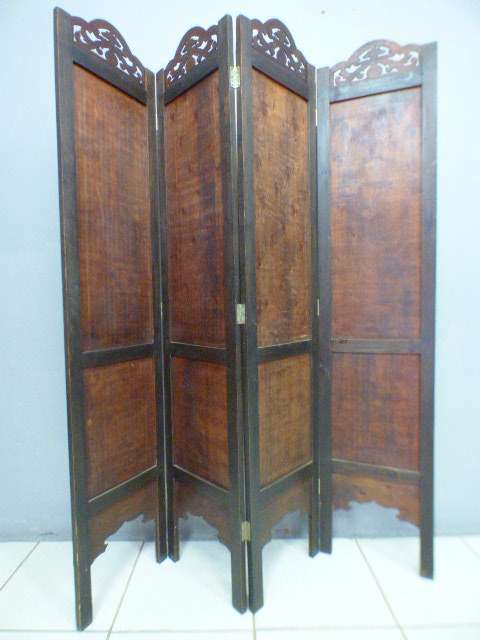 A fabulous wooden 4 panel, very ornate room divider. Beautiful!!!