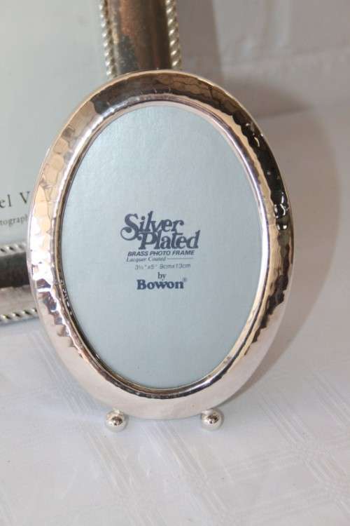 Three beautiful assorted silver metal/ silver plated free standing photo frames