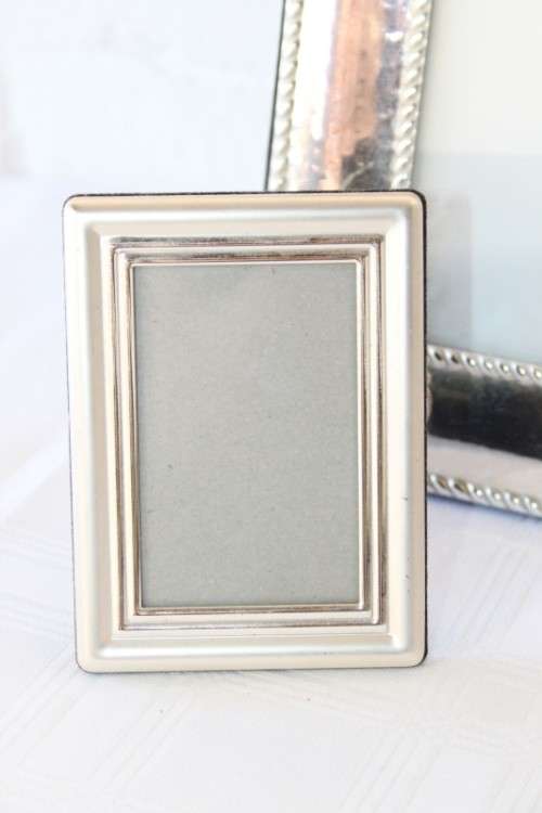 Three beautiful assorted silver metal/ silver plated free standing photo frames
