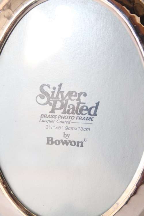 Three beautiful assorted silver metal/ silver plated free standing photo frames