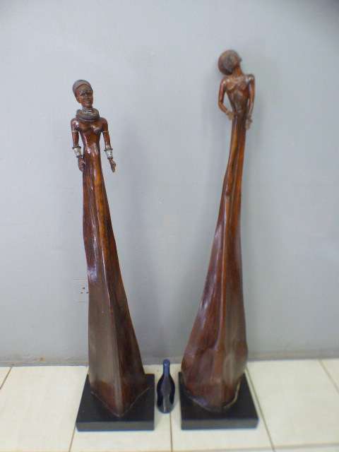 Two spectacular & beautifully hand carved original "Audrey Rudnick" Pod people. Spectacular!!!