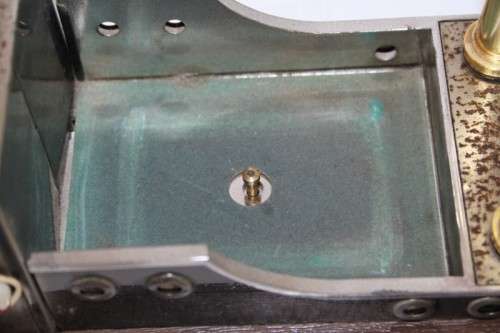 An amazing vintage tugboat decanter with a wind-up music box and four shot glasses