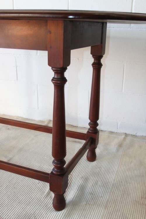 A wonderful solid teak "drop-leaf" table w/ side panels, very compact and perfect for limited space