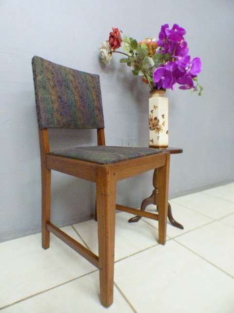 A lovely vintage upholstered Oak occasional chair, perfect in informal areas.