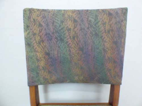 A lovely vintage upholstered Oak occasional chair, perfect in informal areas.