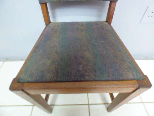 A lovely vintage upholstered Oak occasional chair, perfect in informal areas.