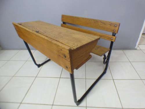 An awesome vintage/ antique? solid teak two seater school desk in wonderful condition.