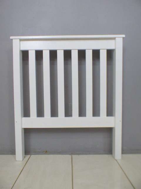 A lovely sturdy painted white wood single bed headboard. Beautiful in all bedrooms!!RS17Bed