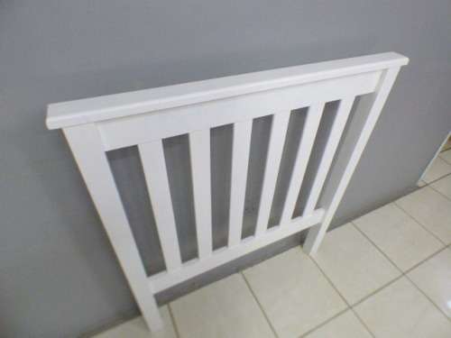A lovely sturdy painted white wood single bed headboard. Beautiful in all bedrooms!!RS17Bed