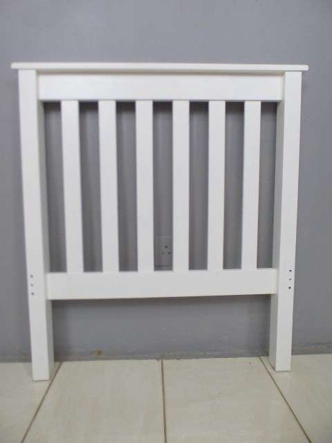 A lovely sturdy painted white wood single bed headboard. Beautiful in all bedrooms!!RS17Bed