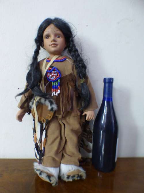 A lovely American Indian porcelain doll, fabulous in a girls room or add to a collection - RS17Sale
