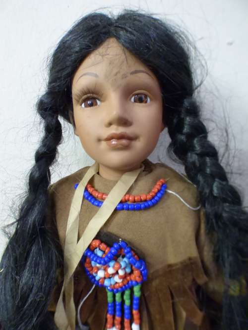 A lovely American Indian porcelain doll, fabulous in a girls room or add to a collection - RS17Sale