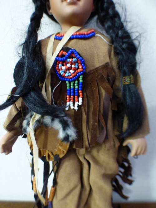 A lovely American Indian porcelain doll, fabulous in a girls room or add to a collection - RS17Sale