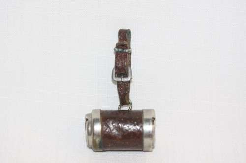 An incredible and rare antique leather clad silver plated double "Sovereign" cylinder coin holder