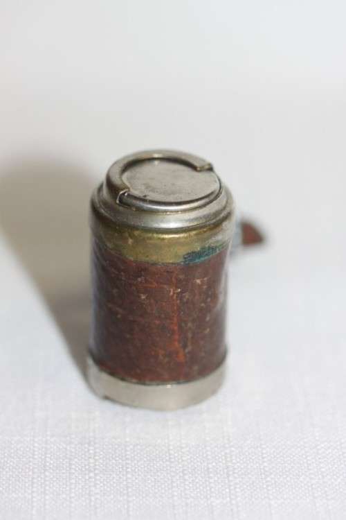 An incredible and rare antique leather clad silver plated double "Sovereign" cylinder coin holder