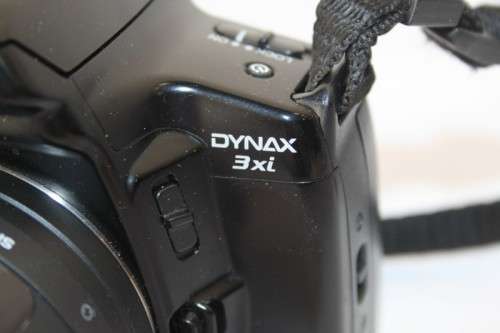 A Minolta Dynax 3xi 35mm film camera with a AF 35-80mm lens in a bag - RS17Sale