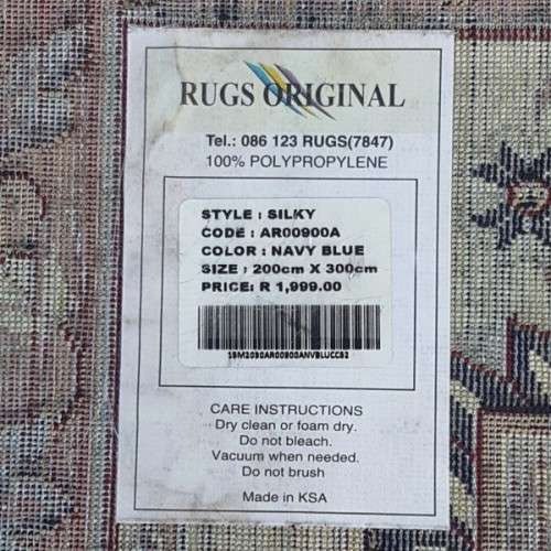 A superb Saudi made navy blue "silky" carpet with a stunning pattern in awesome condition