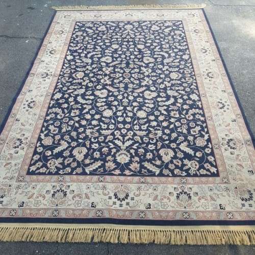 A superb Saudi made navy blue "silky" carpet with a stunning pattern in awesome condition
