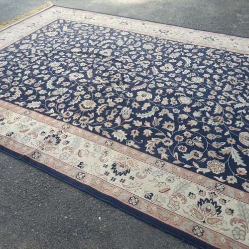 A superb Saudi made navy blue "silky" carpet with a stunning pattern in awesome condition
