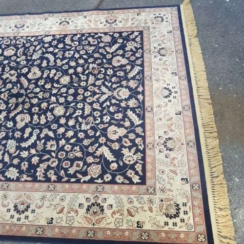 A superb Saudi made navy blue "silky" carpet with a stunning pattern in awesome condition