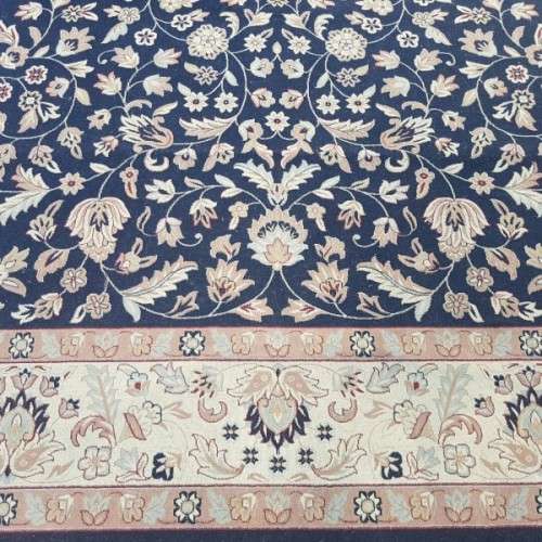 A superb Saudi made navy blue "silky" carpet with a stunning pattern in awesome condition