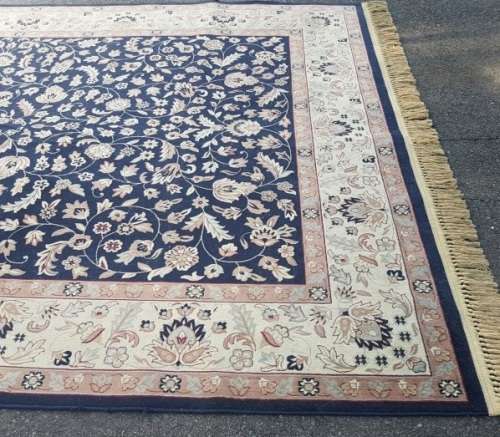 A superb Saudi made navy blue "silky" carpet with a stunning pattern in awesome condition