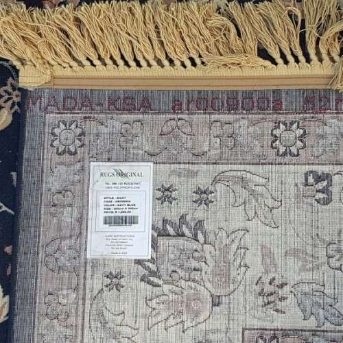 A superb Saudi made navy blue "silky" carpet with a stunning pattern in awesome condition