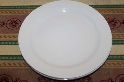 An assortment of plastic plates and bowls - perfect to take on camping trips