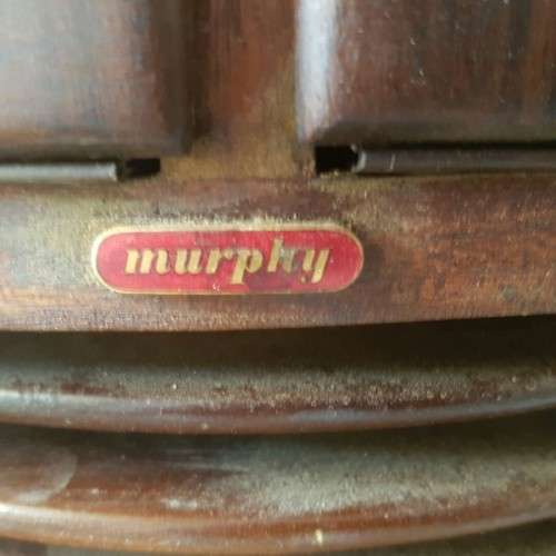 A vintage curved glass ball & claw radiogram display cabinet w/ original components for restoration
