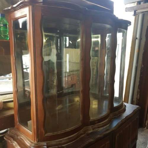 A vintage curved glass ball & claw radiogram display cabinet w/ original components for restoration