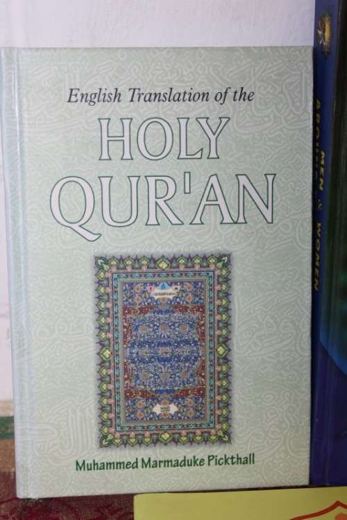 Three religious Muslim books including an English copy of the Holy Quran - all in good condition!