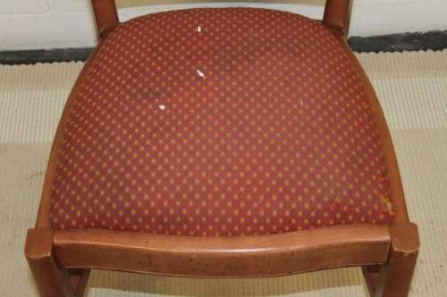 A lovely and sturdy solid cherry wood occasional chair with an upholstered seat