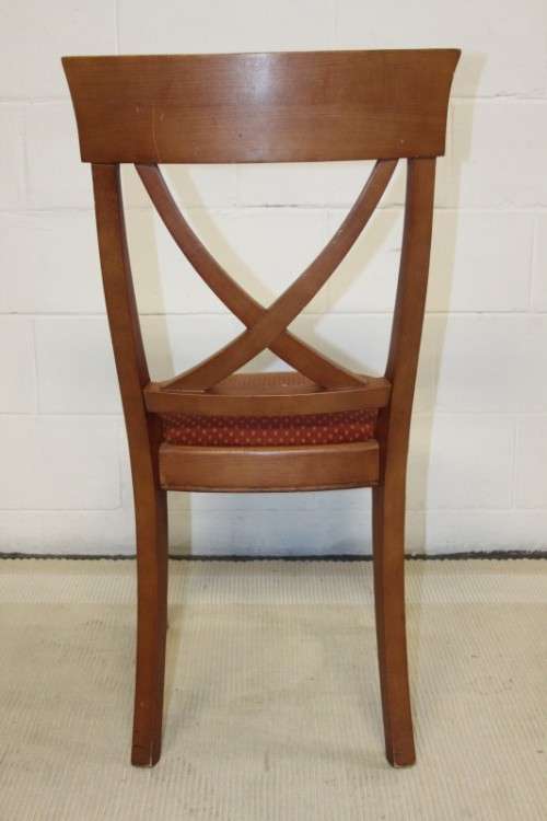 A lovely and sturdy solid cherry wood occasional chair with an upholstered seat