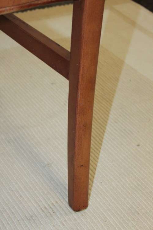 A lovely and sturdy solid cherry wood occasional chair with an upholstered seat