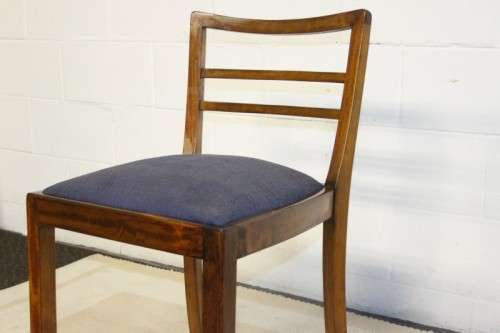 A very well made solid teak occasional chair with a upholstered seat in stunning condition
