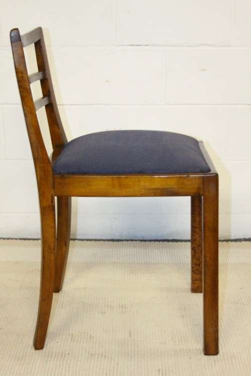 A very well made solid teak occasional chair with a upholstered seat in stunning condition