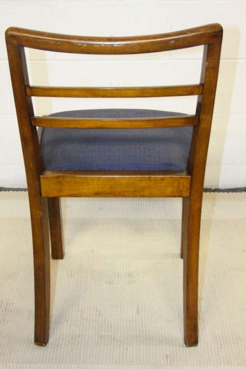 A very well made solid teak occasional chair with a upholstered seat in stunning condition