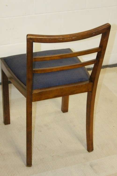 A very well made solid teak occasional chair with a upholstered seat in stunning condition