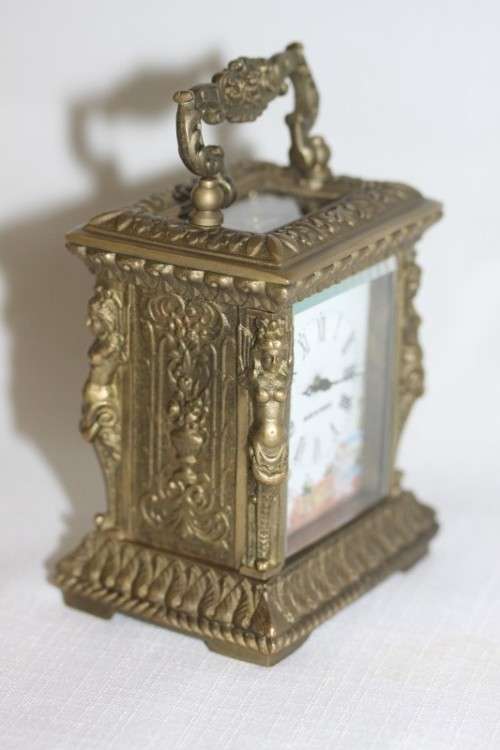 **RS17** A gorgeous ornate brass bevelled glass carriage clock w/ repousse detail & roman numerals